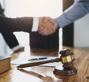 How We Can Help Handshake with gavel